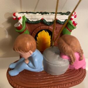 EUC- festive fireplace with children ornament